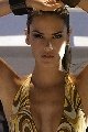 Alessandra Ambrosio in swimsuit for Harpers and Queen